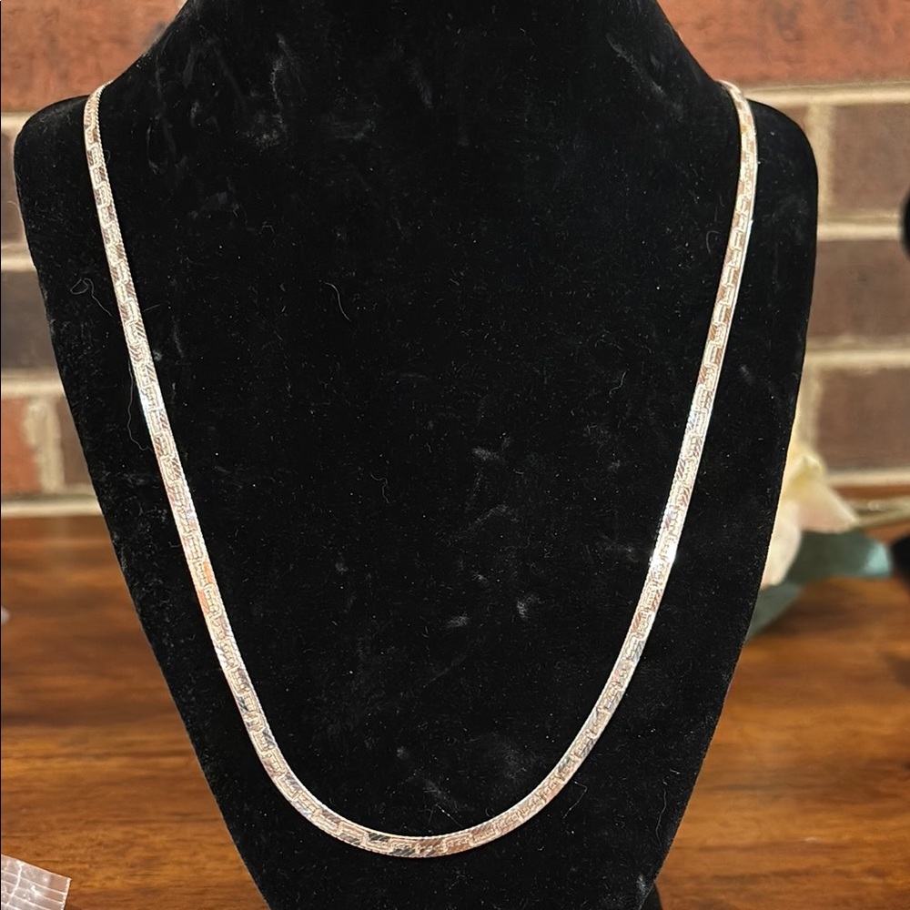 Sterling Sliver Herringbone Necklace with Polished Finish. 24 inches long.